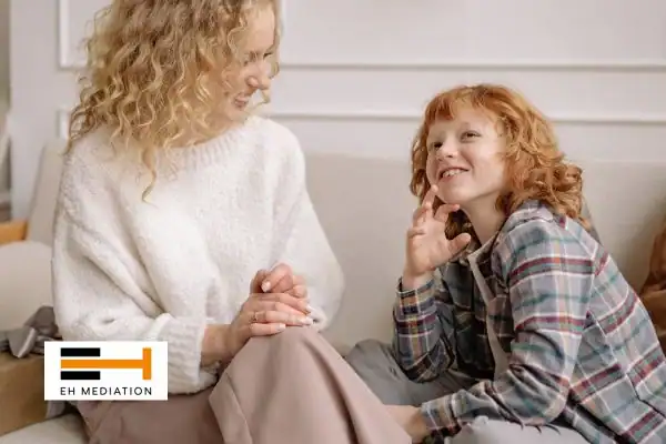 Happy mother and child after sorting child arrangements mediation Burnley